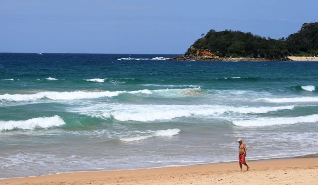 Wellen am Manly Beach. Das Surfrevier ist nur eines der Gebiete, das unter den Folgen des Klimawandels zu verschwinden droht. 