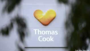 Das Logo des britischen Reisekonzerns Thomas Cook an der Zentrale des deutschen Ablegers Das Logo des britischen Reisekonzerns Thomas Cook an der Zentrale des deutschen Ablegers