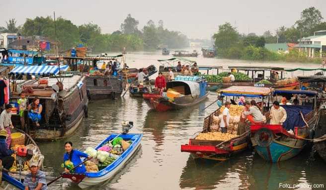 Handel auf dem Mekong: Entlang der Route treffen die Touristenboote immer wieder auf sogenannte »Schwimmende Märkte«